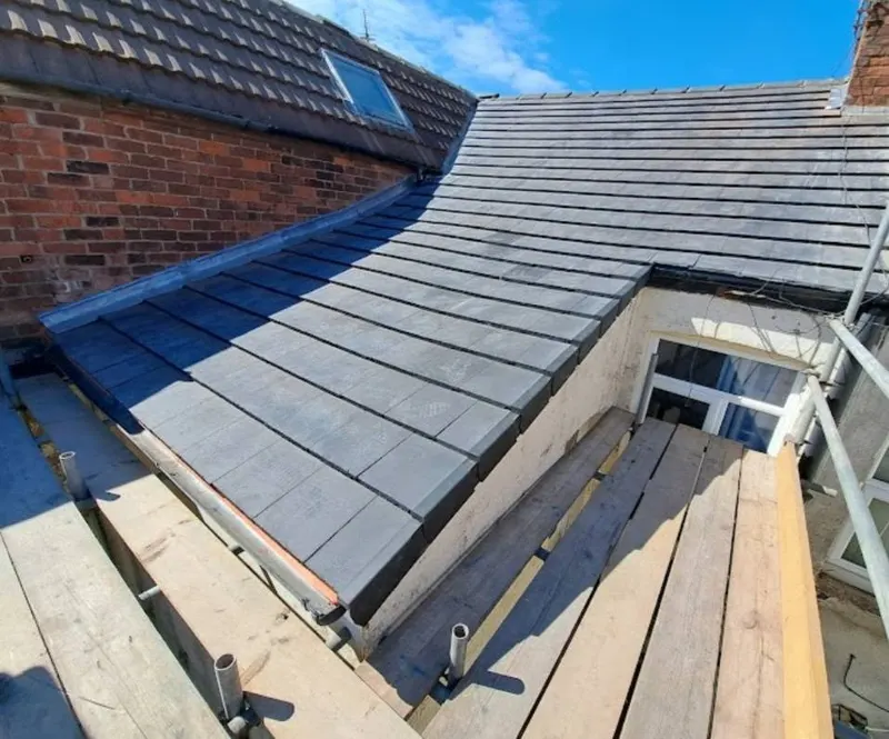 Natural slate roof and dormer completed by roofers in Harrogate